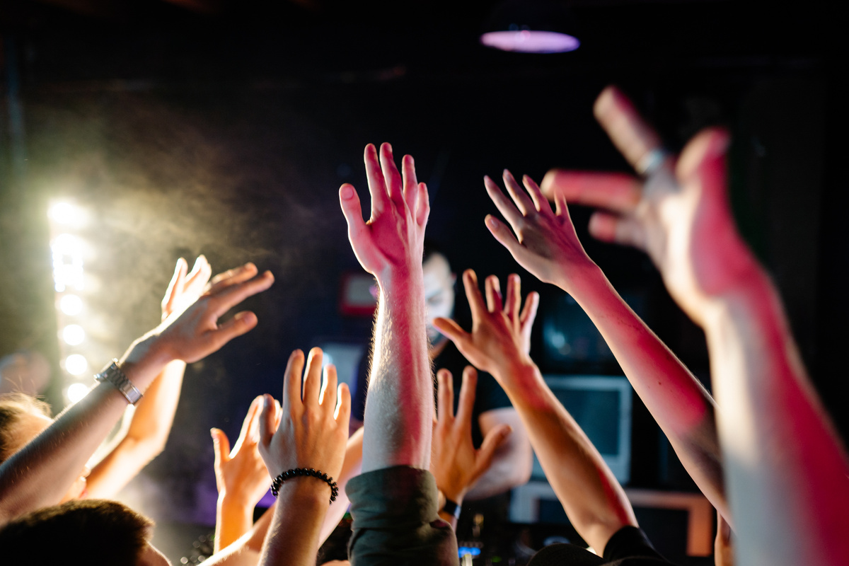 People Raising Their Hands Up